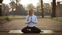 Join Carlie Barlow for a rejuvenating yoga session at Warner Hotels wellness retreat.